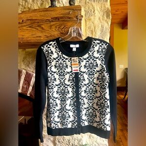 Women’s sweater, size small. New with tags.